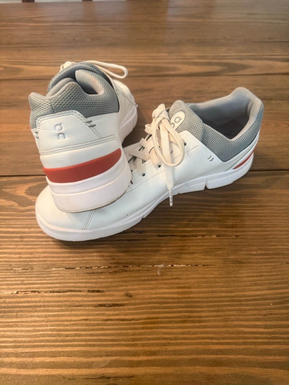 On Cloud The Roger White Sneakers with Gray Interior and Orange Heel Stripe